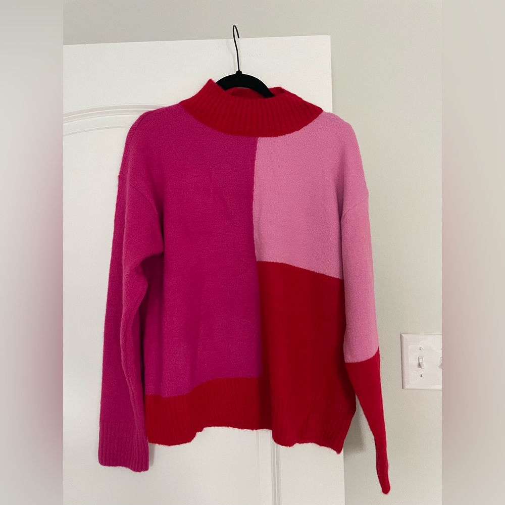 Beautiful sweater. Never worn, no tags. Size medium
